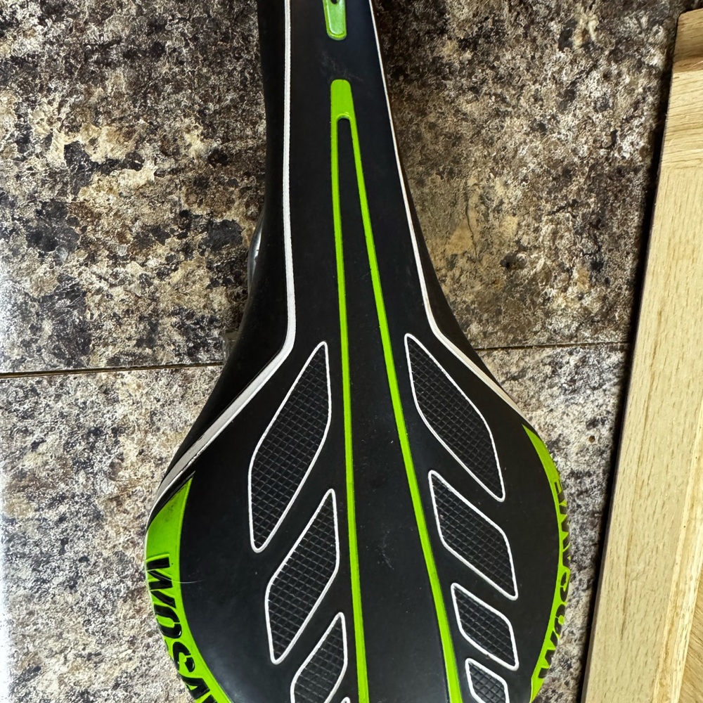 Black and Green Bicycle Saddle
